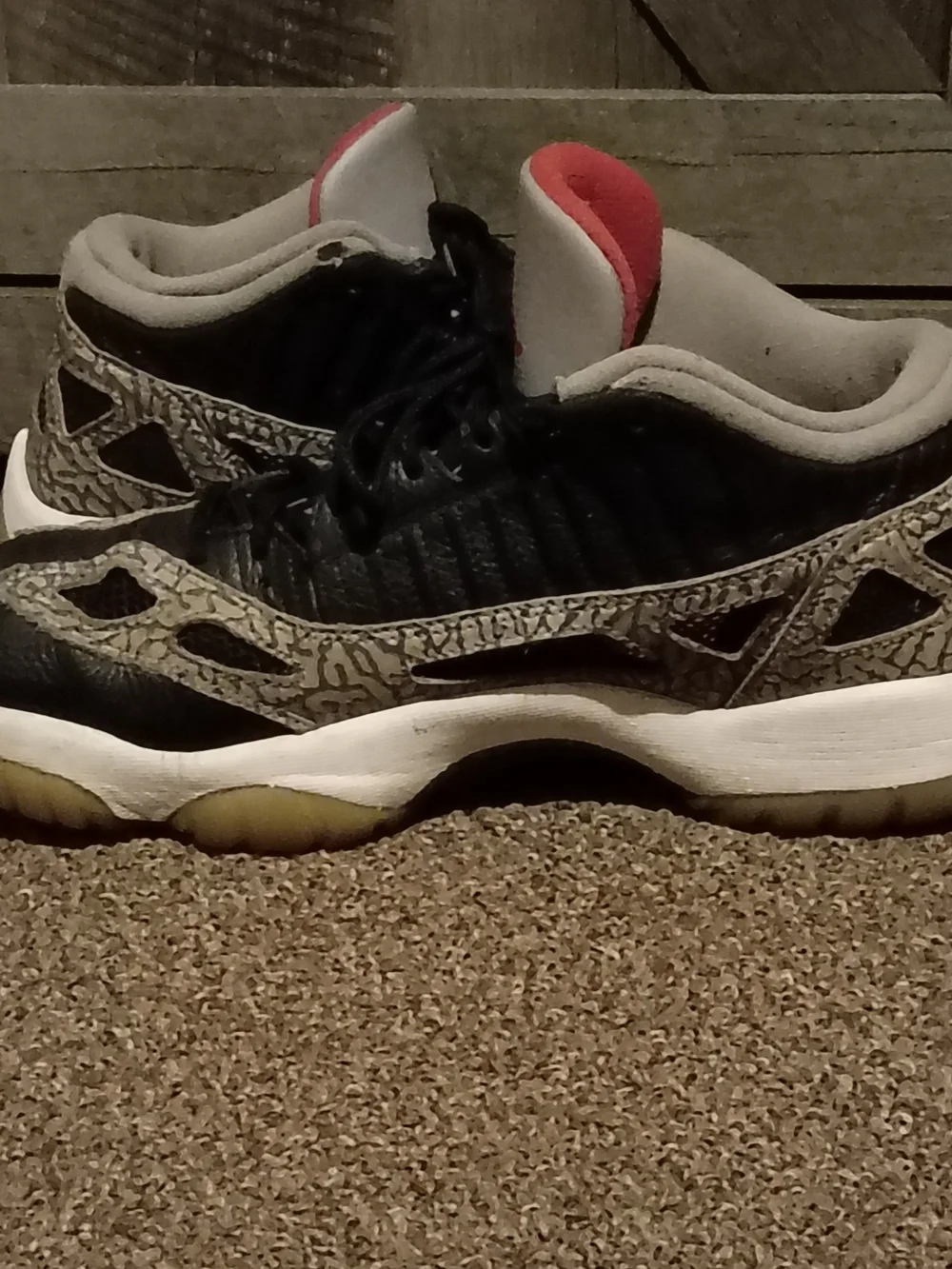 Jordan 11 Retro Low IE sneakers in Black, White and Red
